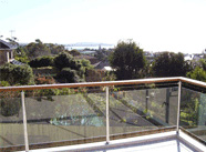 Frameless glass balustrading on deck